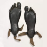 05 – Rubber shoes shaped like human feet, used to disguise soldiers footprints in Southeast Asia and the Pacific