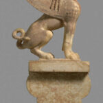 03-Marble capital and finial in the form of a sphinx